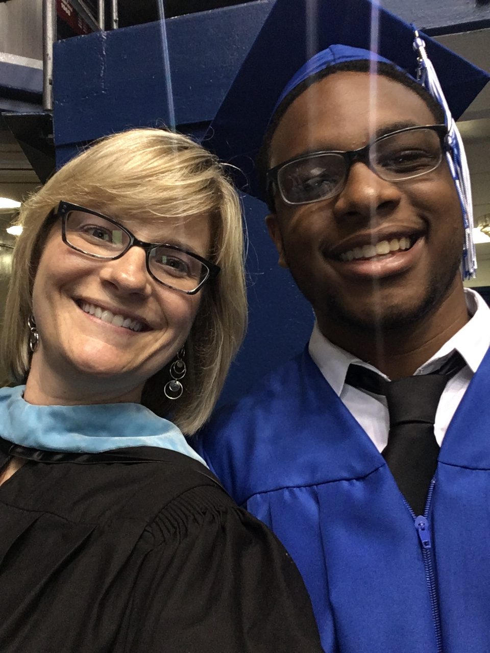 Amy Cox with student at Dunbar High School graduation